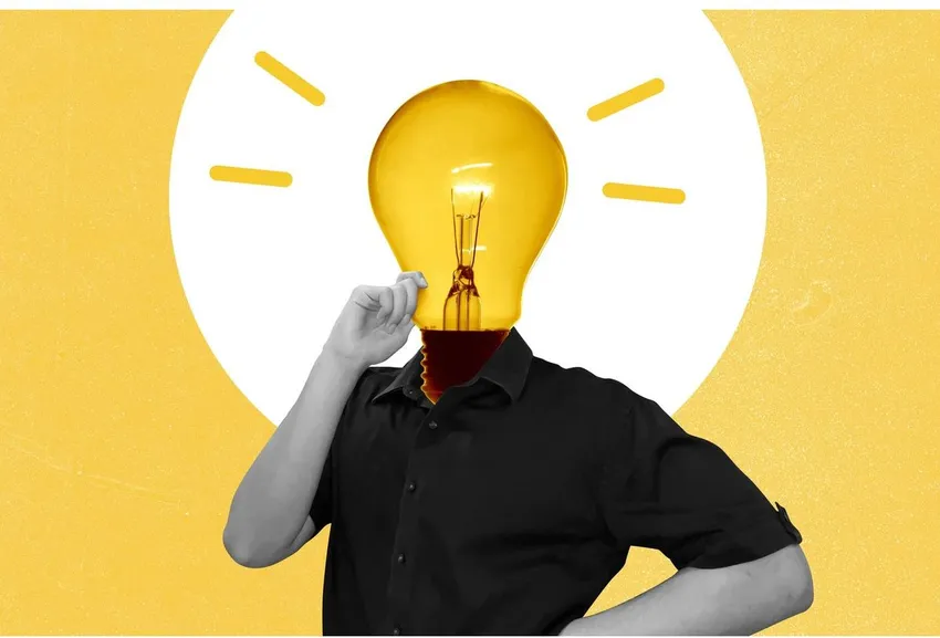 Postava s hlavou ve tvaru rozsvícené žárovky jako symbol vlastní myšlenky odlišené od AI